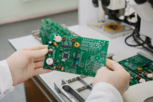 Microchip production factory. Computer expert
